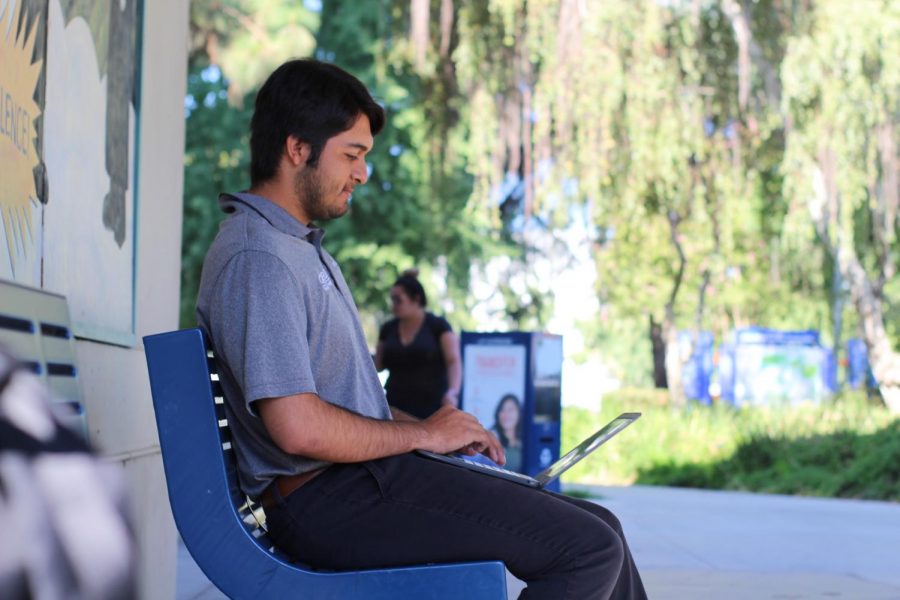 Tuesday%27s+Photo+of+the+Day%3A++Students+are+able+to+study+in+between+classes+using+the+campus%27+wifi.+Pictured%3A+Omar+Lopez%2C+18%2C+plans+to+major+in+Physical+Therapy+or+Psychology.+