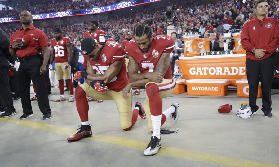 San+Francisco+49ers+safety+Eric+Reid+%2835%29+and+quarterback+Colin+Kaepernick+%287%29+kneel+during+the+national+anthem+before+an+NFL+football+game+against+the+Los+Angeles+Rams+in+Santa+Clara%2C+Calif.%2C+Monday%2C+Sept.+12%2C+2016.+%28AP+Photo%2FMarcio+Jose+Sanchez%29+ORG+XMIT%3A+FXN