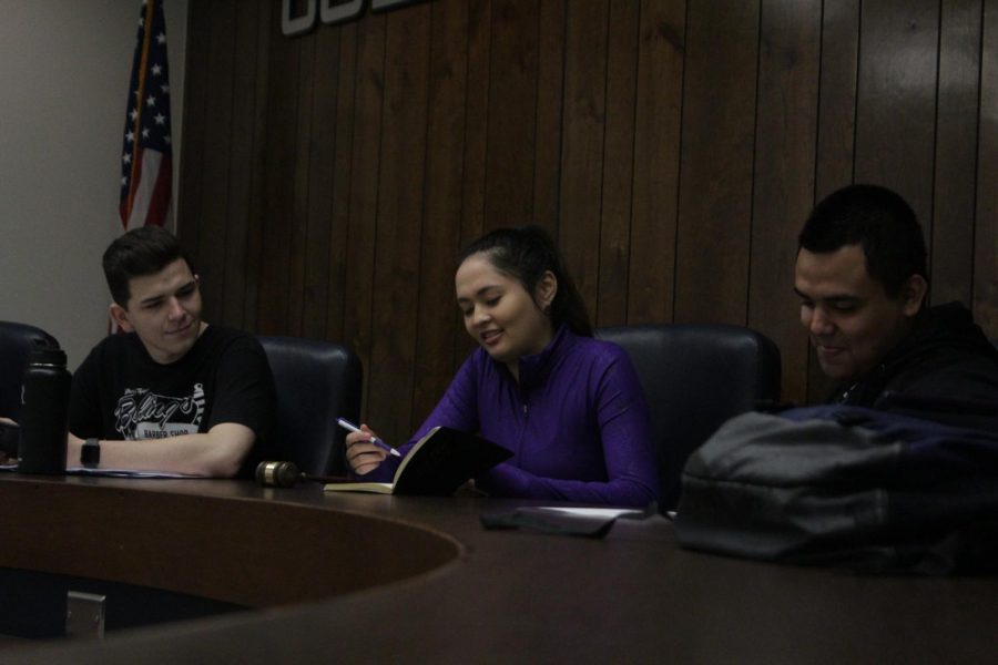 Kenneth O’Leary (left), Isabella O’Keeffe (center), Antonio Gutierrez (right) prepare to begin their meeting.