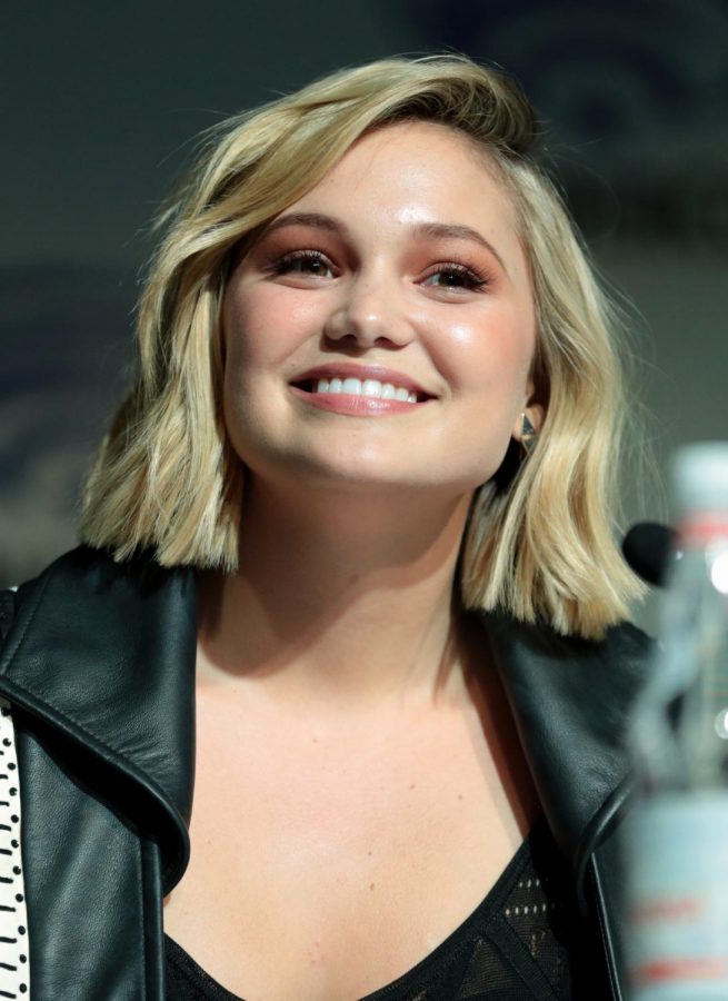 Pictured is Olivia Holt who plays Kate Wallis back in March of 2018. Picture credits to Gage Skidmore.
