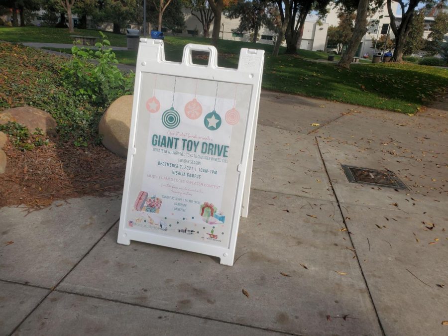 Giant Toy Drive sign on Visalia campus