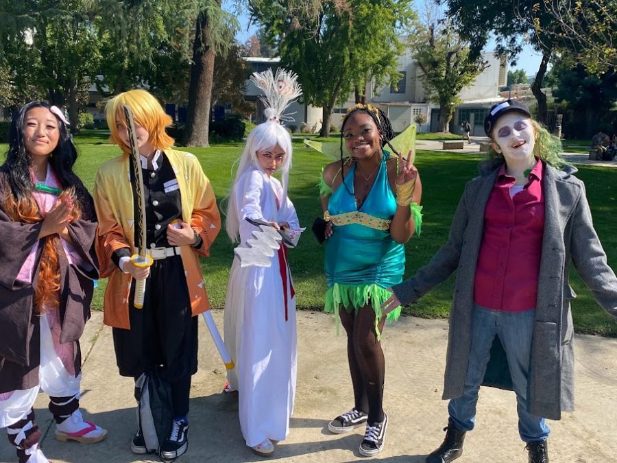 Winners of COS Costume contest (From Left to Right): Duo- Claire Yang,  and Dusty Fayas.  Creative- Erica Paola.  Cute/Adorable: Jessica Smith. Scary: Molly Fox