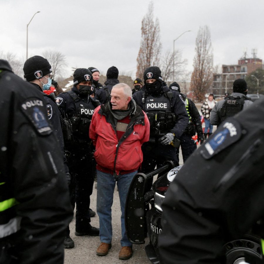 Photo+of+protester+being+arrested+in+Ottawa%2C+photo+via+Carlos+Osorio+at+The+New+York+Times
