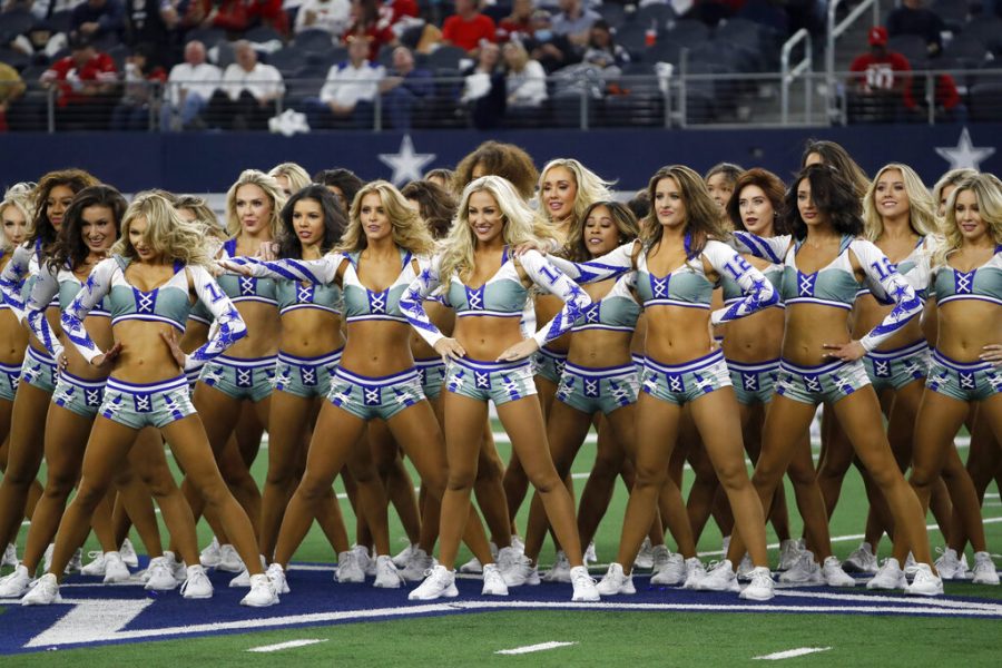 The Dallas Cowboys Cheerleaders perform during halftime of an NFL football game against the San Francisco 49ers in Arlington, Texas, Sunday, Jan. 16, 2022. (AP Photo/Roger Steinman)
